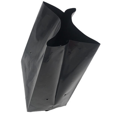 Το άσπρο μαύρο πλαστικό αυξάνεται τις τσάντες βρεφικών σταθμών τσαντών με τις τρύπες